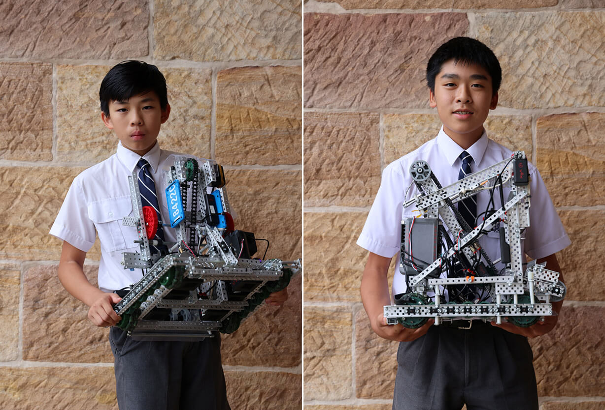 Students holding trophies